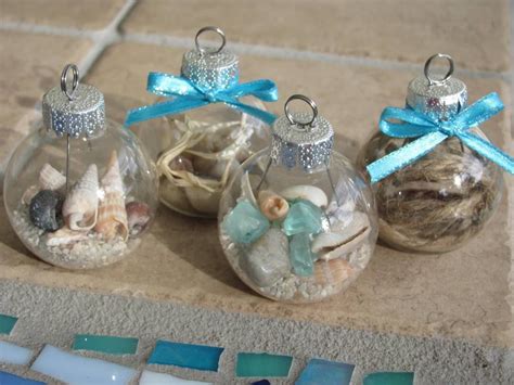 Christmas balls and seashells on the beach near the sea. WordPress.com | Beach christmas ornaments, Nautical ...