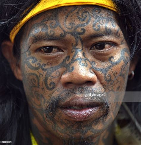 A Tatooed Dayak Tribesman From West Kalimantan In Borneo Island