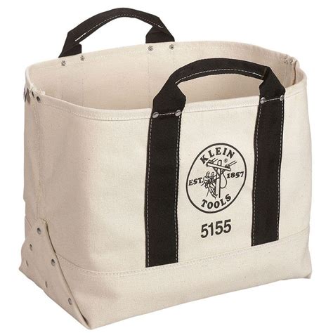This has big pockets on the outside, and separated pockets on the inside to keep different tools. Klein Tools 17 in. Canvas Tool Bag-5155 - The Home Depot