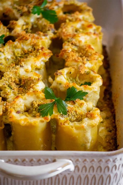 Spinach Lasagna Roll Ups With Artichokes And Pistachio Parmesan Topping