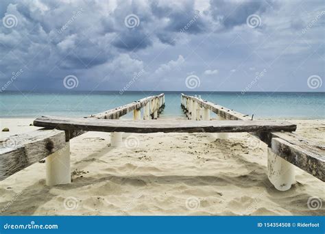 Lonely Old Wooden Dock On The Coast Stock Photo Image Of Coastline
