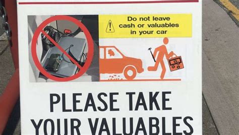 Black Stick Figures On Sf Car Burglary Warning Signs Changed To Orange