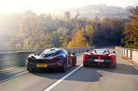 Hybrid Is The New Fast Ferrari Laferrari Vs Mclaren P1