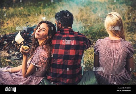 Brunette Girl Leaning On Her Babefriend Turn Back Friends Sitting On Grass Next To Campfire