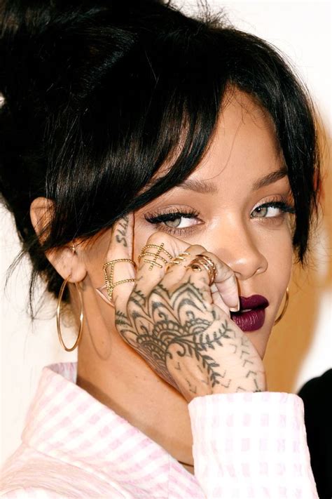 She got the tattoo on her right paw. Rihannas Tattoos 9 photos Morably | Hair as I dream ...