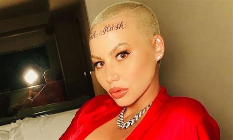 Fans don't want to believe it! Amber Rose Defends Her Forehead Tattoo Amidst Backlash ...