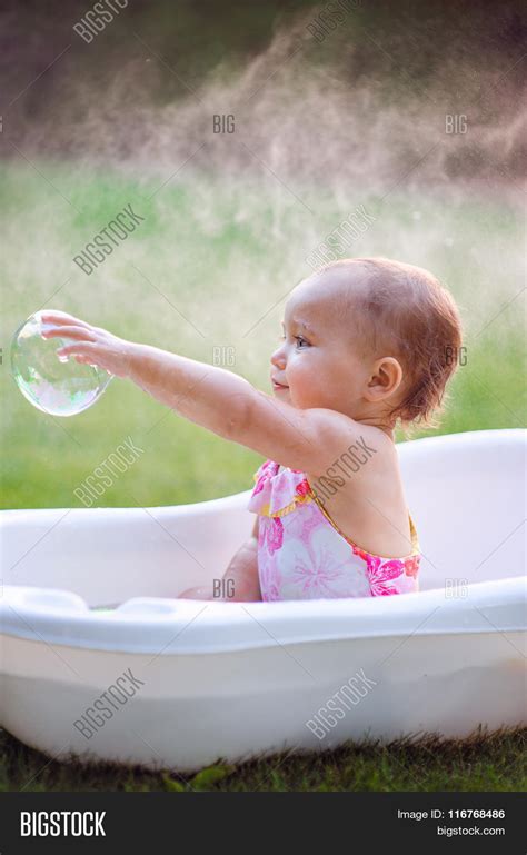 Little Girl Bathes Image And Photo Free Trial Bigstock