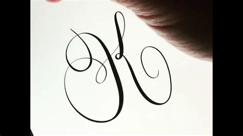 Calligraphy K In Cursive