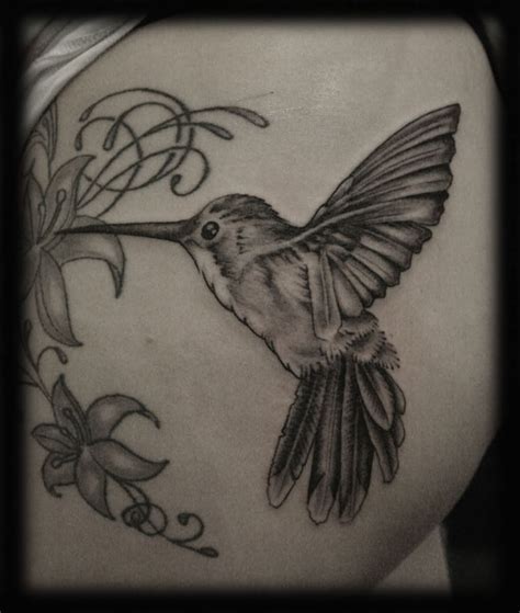Special hummingbird tattoo designs like this can only be gotten from the handiwork of a skilled tattooist. Black And Grey Hummingbird Tattoo Design | Hummingbird ...