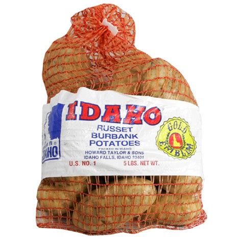White potatoes are medium, round to long shape; Potatoes Idaho Russet