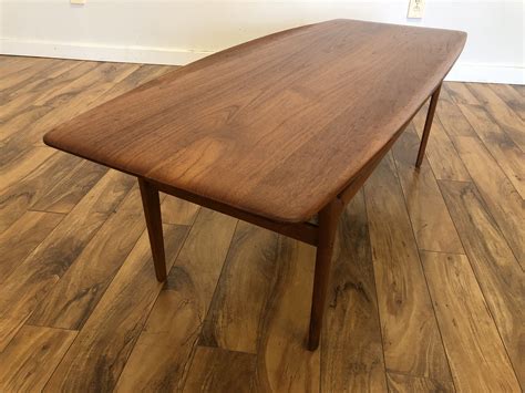 Vintage surfboard coffee table — home design and decor mid century, source: SOLD - Danish Teak Surfboard Coffee Table - Modern to Vintage