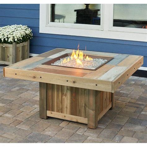 Stone fire pits look incredibly neat and go with almost any kind of home decor. Outdoor Fire | Fire pit table, Natural gas fire pit, Fire ...