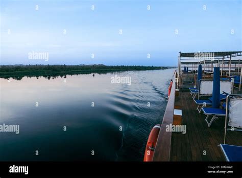 Immerse yourself in the splendor of the Nile River's edge as you cruise