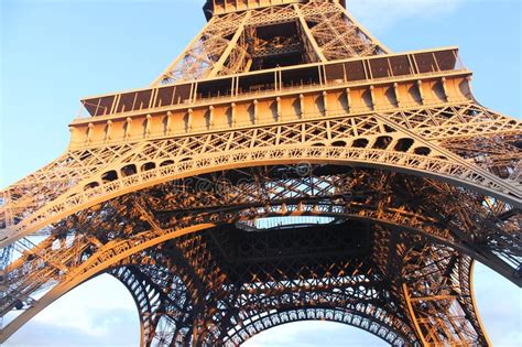 Close Up Of The Eiffel Tower In Paris With Blue Sky Stock Photo Image