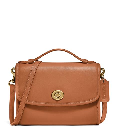 Coach Leather Kip Turnlock Cross Body Bag In Natural Lyst