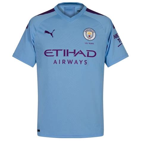 The black away kit contains a pattern of the bridge near bridgwater canal in castlefield. Puma Man City Home Jersey 2019-2020