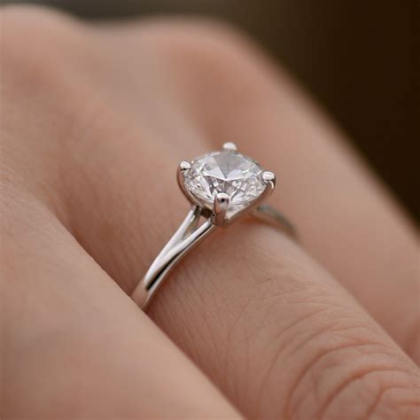 4 Prong Round Brilliant Cut Solitaire Diamond With Suspended V
