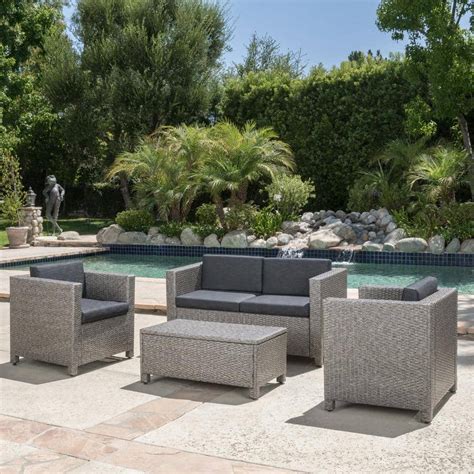 Noble House 4 Piece Faux Rattan Patio Seating Set With Dark Gray