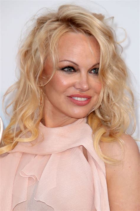 After high school, she worked as a fitness instructor until she was discovered at a canadian football game when she was broadcast over the stadium's giant screen in her. Pamela Anderson - amfAR Cannes Gala 2019 (more pics ...
