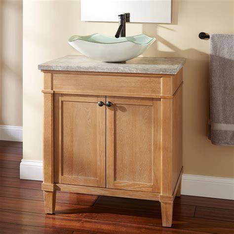 Detailed doors conceal storage shelves that help tuck away toiletries, tissues, or cleaning supplies, while a lower open shelf offers a. Vessel Sink Vanity with Single Sink for Tiny Bathroom ...