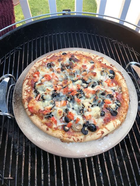 For the best results, wash your pizza stone by hand every few months. Broke in my new Weber pizza stone this evening. Was ...