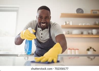 Black Man Cleaning Over Royalty Free Licensable Stock Photos Shutterstock