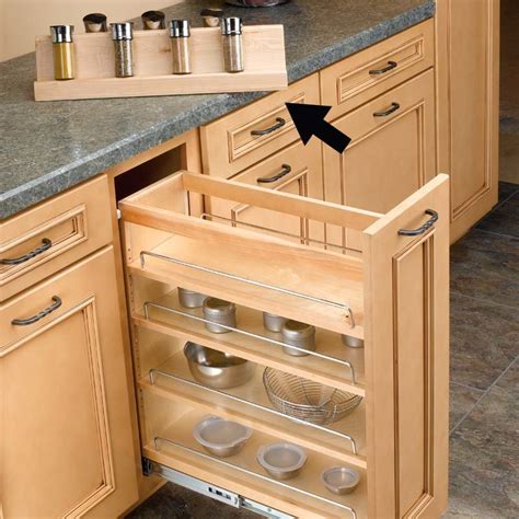 Mount an ordinary towel rack on the back of the cabinet door and keep your lids in a neat row. Rev-A-Shelf Rev A Shelf Spice Rack For RV448BC11C 448-SR11 ...