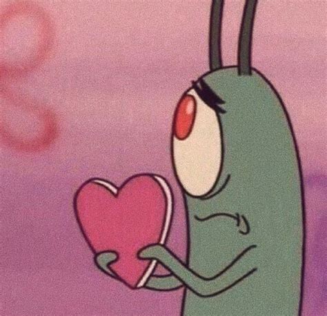 A Cartoon Character Holding A Heart In His Hand
