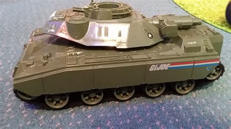 The black pistol of the retail release was not included. GI Joe Tank - ODDMALL OUTPOST