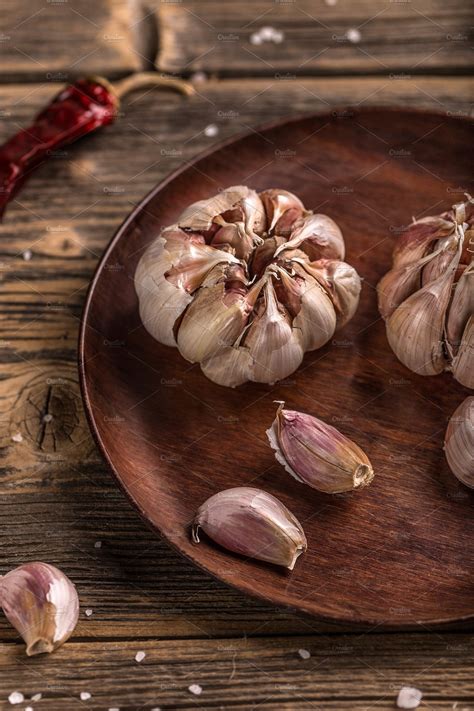 Cloves of garlic ~ Food & Drink Photos ~ Creative Market