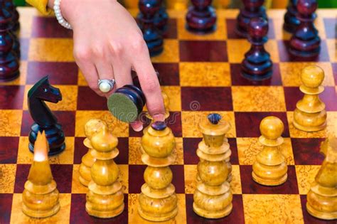 Woman Plays Chess Woman S Hand Moves The Pieces On The Chessboard Stock Image Image Of
