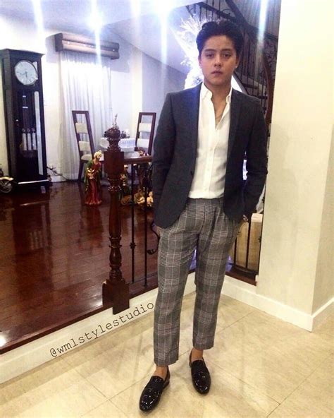 here is the handsome daniel padilla dressed in a grey business suit with a white dress shirt and