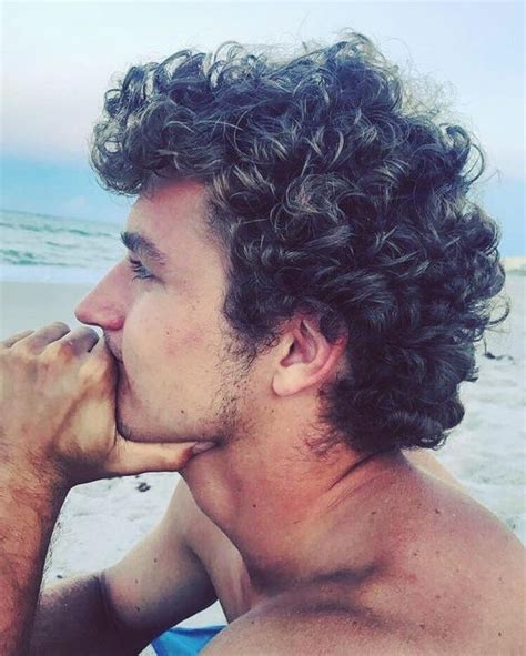 Not every style for curly hair has to be long and windswept. Short & Medium Length Curly Hairstyles for Men - World ...
