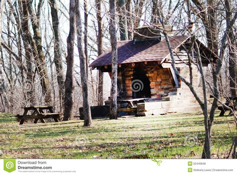 Interesting Small Log Cabin In The Middle Of The Woods Stock Photo