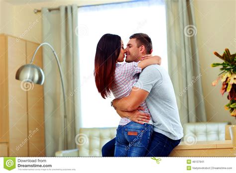 Enjoy our hd porno videos on any device of your choosing! Young Couple Kissing At Home Stock Image - Image of male ...