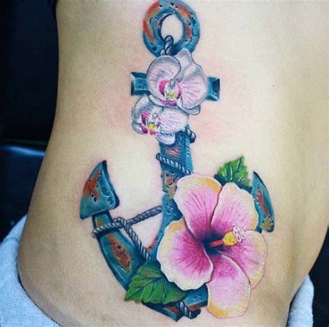 Https://techalive.net/tattoo/anchor With Flowers Tattoo Design