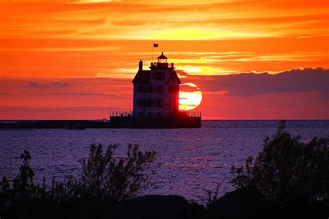 Lighthouse Sunset Photograph By Robert Bodnar Fine Art America