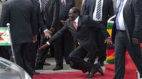 Watch Robert Mugabe Falls Down Steps In Harare Youtube