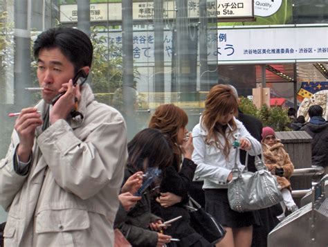 Restrictions Forcing Japanese Smokers Outside Tobacco Reporter