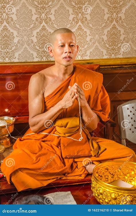 Buddhist Monk Praying In The Temple Wat Traimit Bangkok Editorial