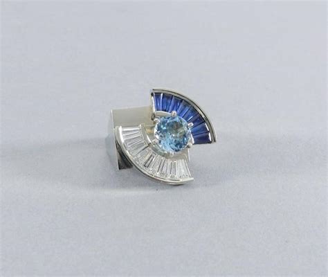 These puzzle rings help your kids have a fun time and learn new things too. Modernist Abstract Aquamarine Sapphire Diamond Gold Two ...