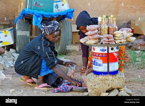 Street Vendor Of Grilled Peanuts Dakar Senegal West Africa Stock
