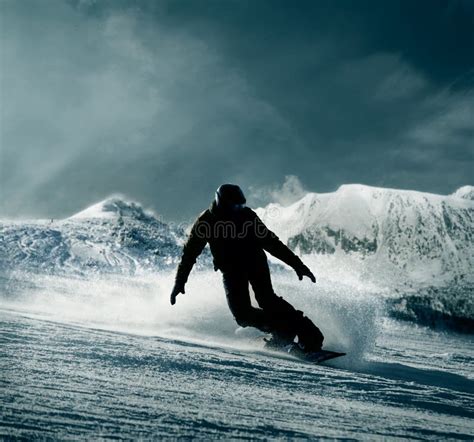 Snowboarder In Action On A Sunny Winter Day Stock Photo Image Of