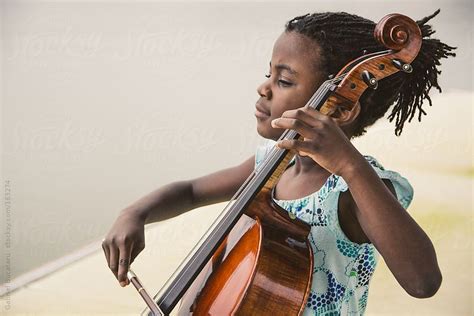 Black Girl With Cello By Stocksy Contributor Gabriel Gabi Bucataru