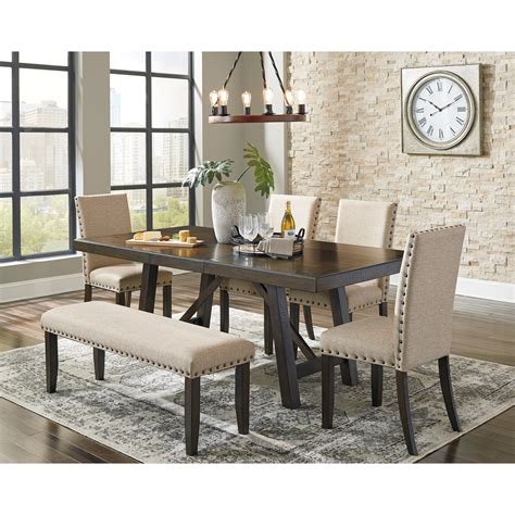 Solid wood dining table with 4 chairs and 1 bench with storage from home centre for sale condition is very good. Signature Design by Ashley Rokane D397-00 Large ...