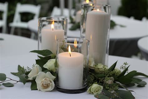 Glass Cylinder Vase Candles With Greenery And Roses Centerpiece