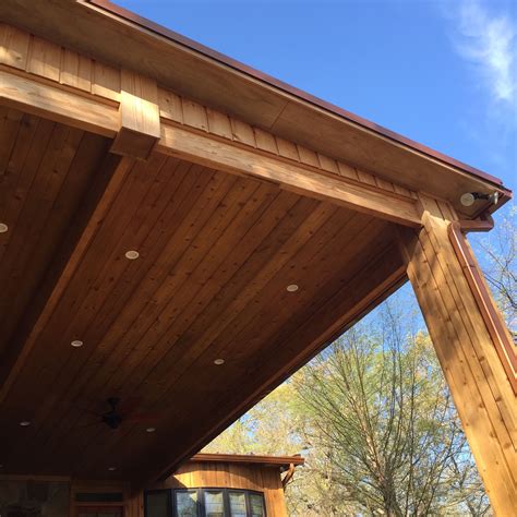 Back porch structure - view of tongue and groove cedar ceiling Acadian