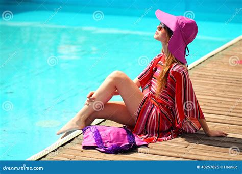 Woman Sunbathing In Bikini At Tropical Travel Resort Beautiful Young Woman Lying On Sun Lounger