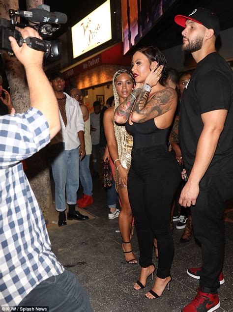 Amber Rose Oozes Sex Appeal In Black Wig At Hollywood Club