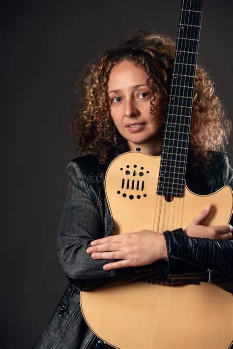 Woman with acoustic guitar stock photo. Image of artist - 86565096